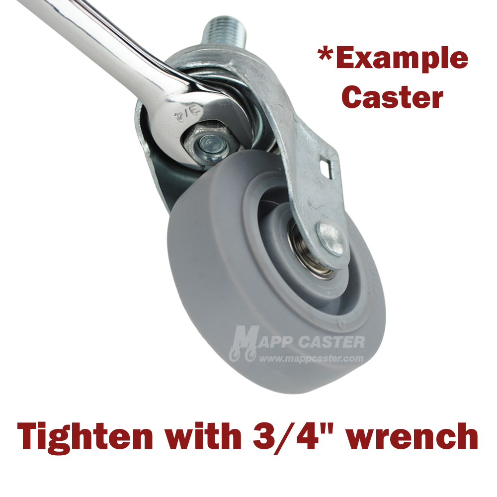 swivel caster with gray wheel with its stem being tightened with a 3/4" wrench